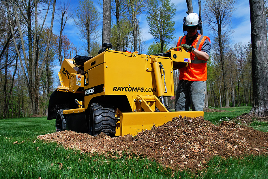 Close-up of professional stump grinding equipment in action in Northeast Ohio